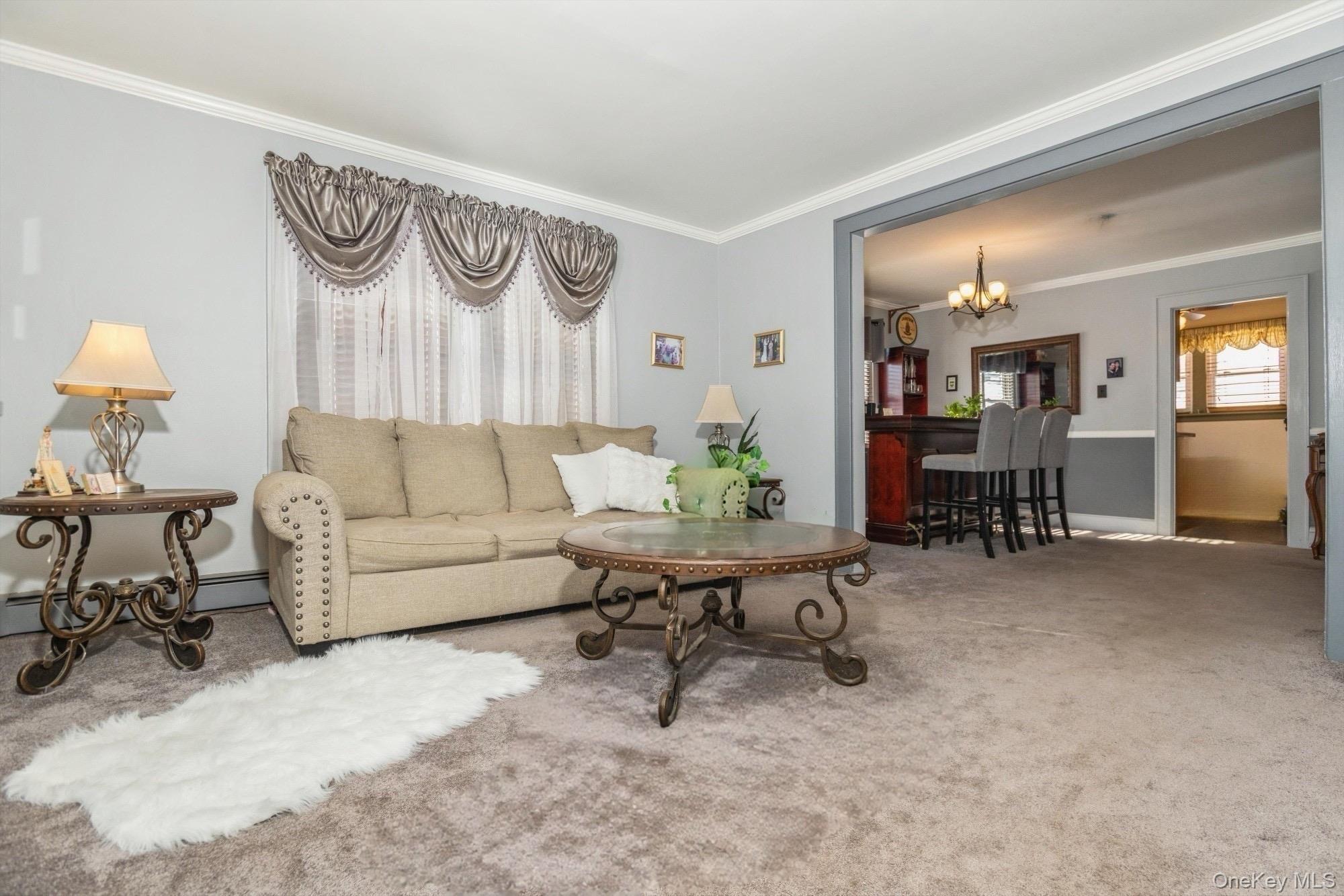 59 Prairie Avenue Suffern, NY 10901 - Photo 3 of 21 a living room with furniture and a table