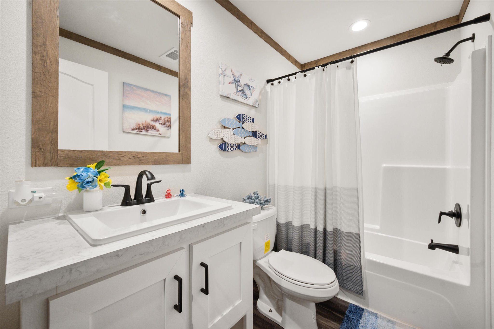 16857 Fm 639 Road East Purdon, TX 76679 - Photo 31 of 38 Full bathroom featuring shower / bath combination with curtain, vanity, and crown molding