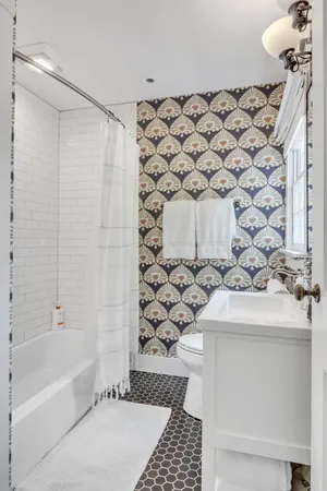 a bathroom with a sink and a bathtub