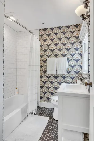 a bathroom with a sink and a bathtub