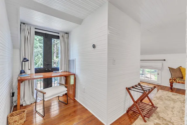 a room with table and chairs