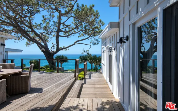 a view of a terrace with a garden
