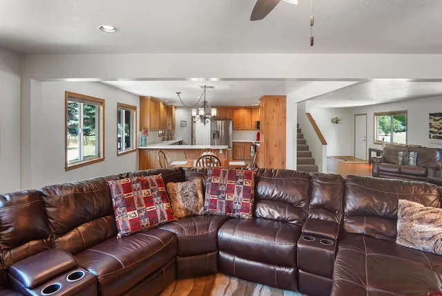 a view of a dining room with furniture window and outside view