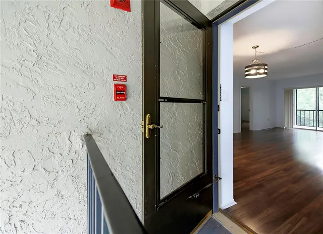 a bathroom with a shower and a sink