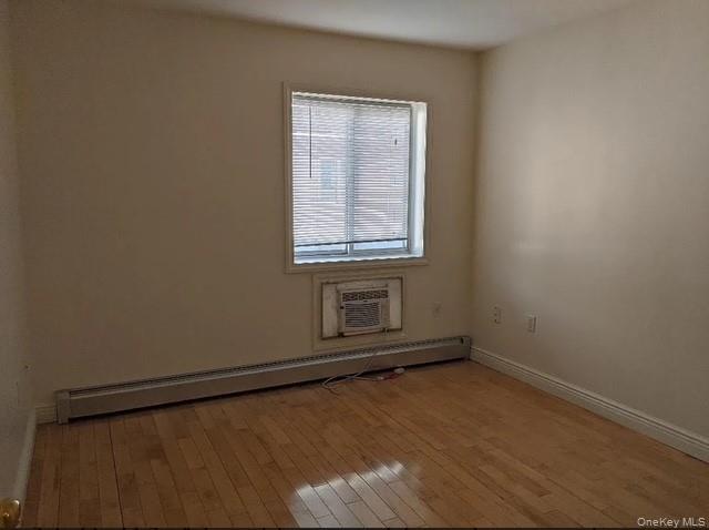 150-44 Northern Boulevard, Unit 4B Queens, NY 11354 - Photo 3 of 7 an empty room with a window