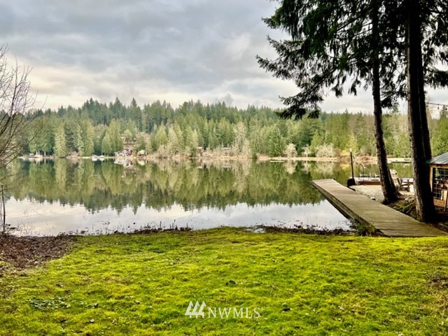 1517 Southwest Lake Roesiger Road Snohomish, WA 98290 - Photo 4 of 26 a view of a lake with houses