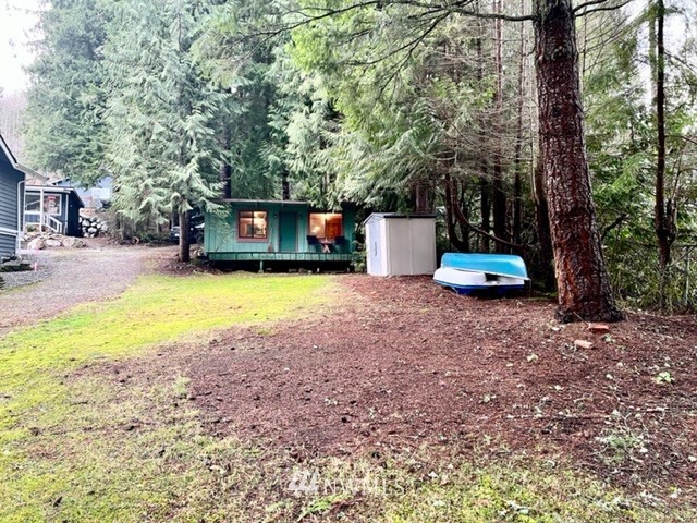 1517 Southwest Lake Roesiger Road Snohomish, WA 98290 - Photo 5 of 26 a view of a house with backyard space and sitting area