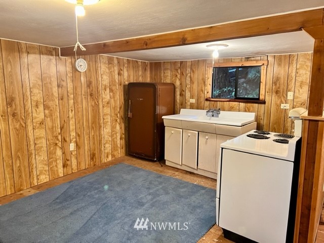 1517 Southwest Lake Roesiger Road Snohomish, WA 98290 - Photo 6 of 26 a view of a storage & utility room with washer and dryer