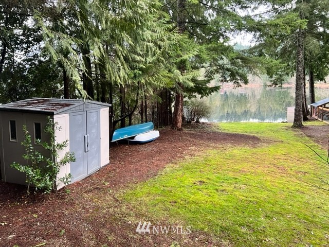 1517 Southwest Lake Roesiger Road Snohomish, WA 98290 - Photo 9 of 26 a view of a backyard with a tree