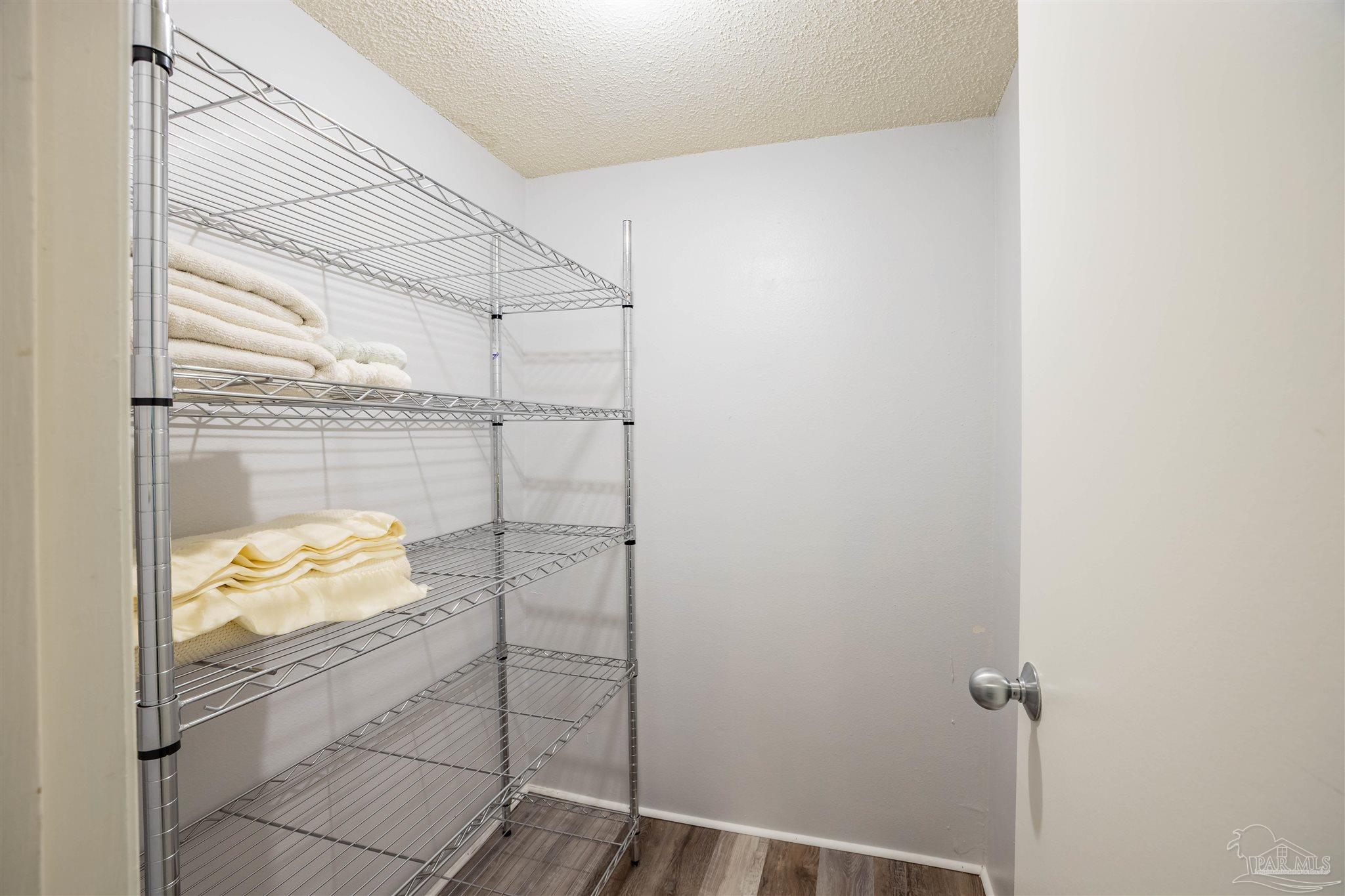 14100 River Road, Unit 228B Pensacola, FL 32507 - Photo 17 of 41 a bathroom with a glass door shower