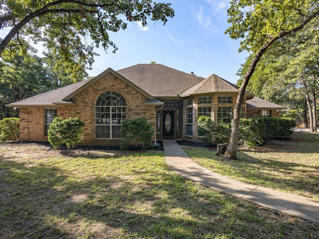 177 Comanche Moon Trail Decatur, TX 76234 - Photo 1 of 1 a view of a house with a yard
