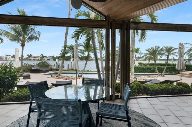 a outdoor dining space with furniture