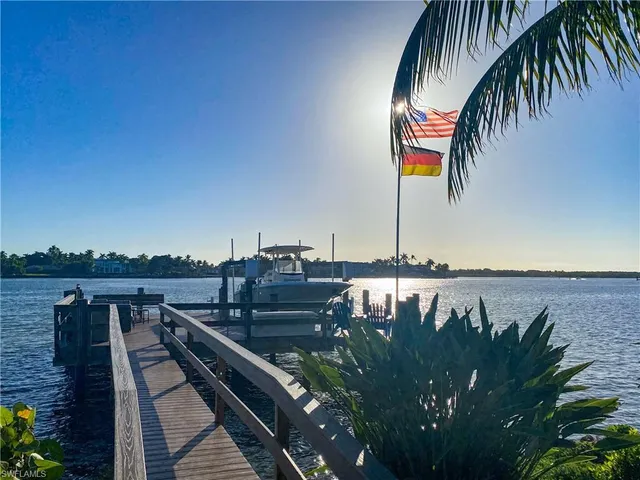 a view of a balcony with chairs