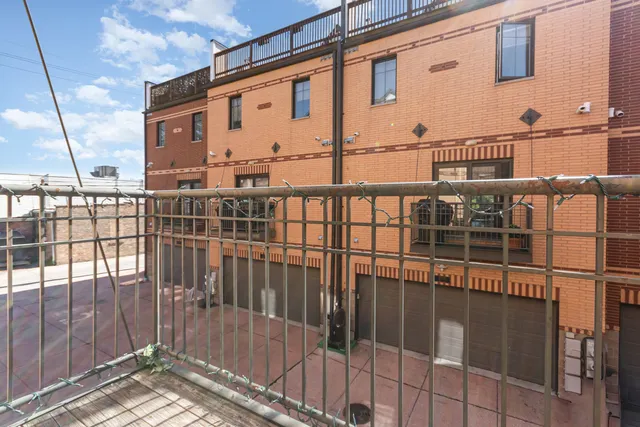 a view of a building from a balcony