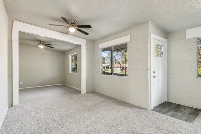 an empty room with windows