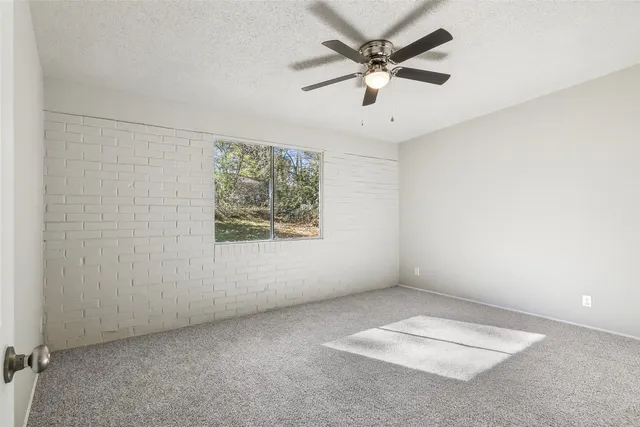 a bedroom with a bed and furniture