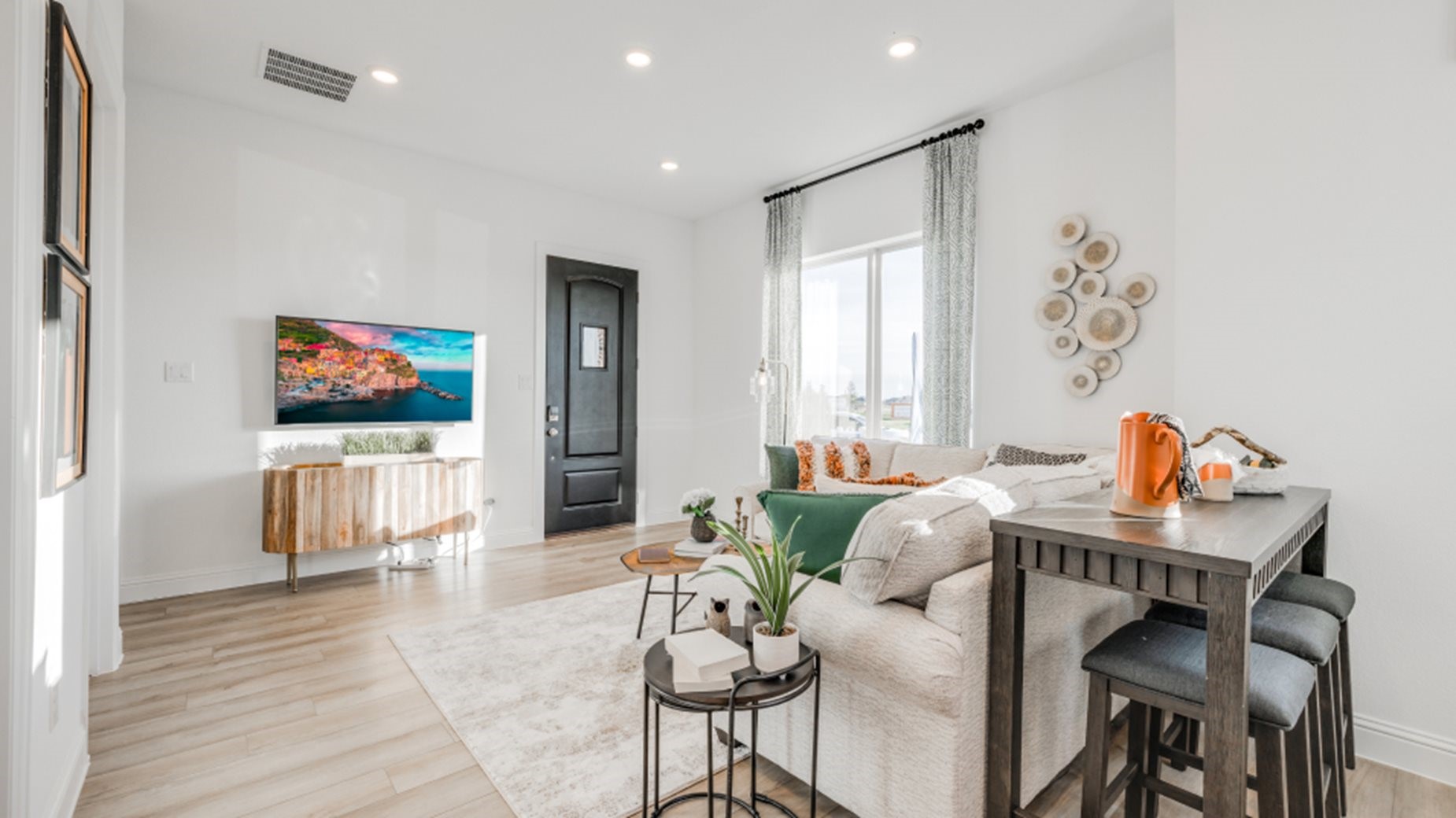 31535 Fern Grove Road Fulshear, TX 77423 - Photo 25 of 26 a living room with furniture and a flat screen tv
