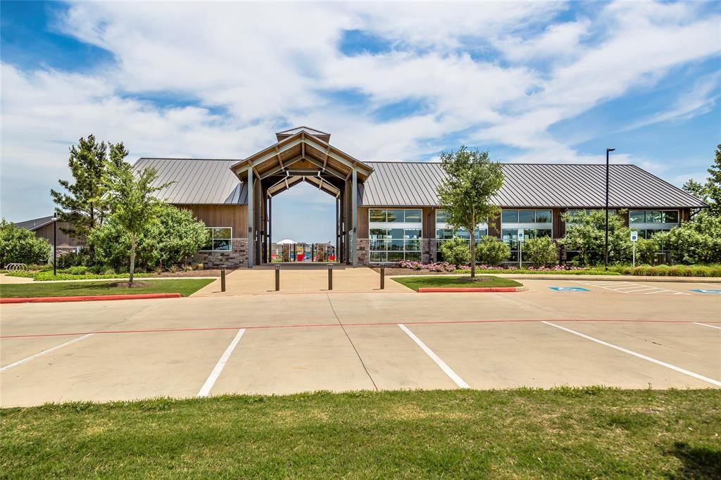 31535 Fern Grove Road Fulshear, TX 77423 - Photo 9 of 26 a house view with a garden space