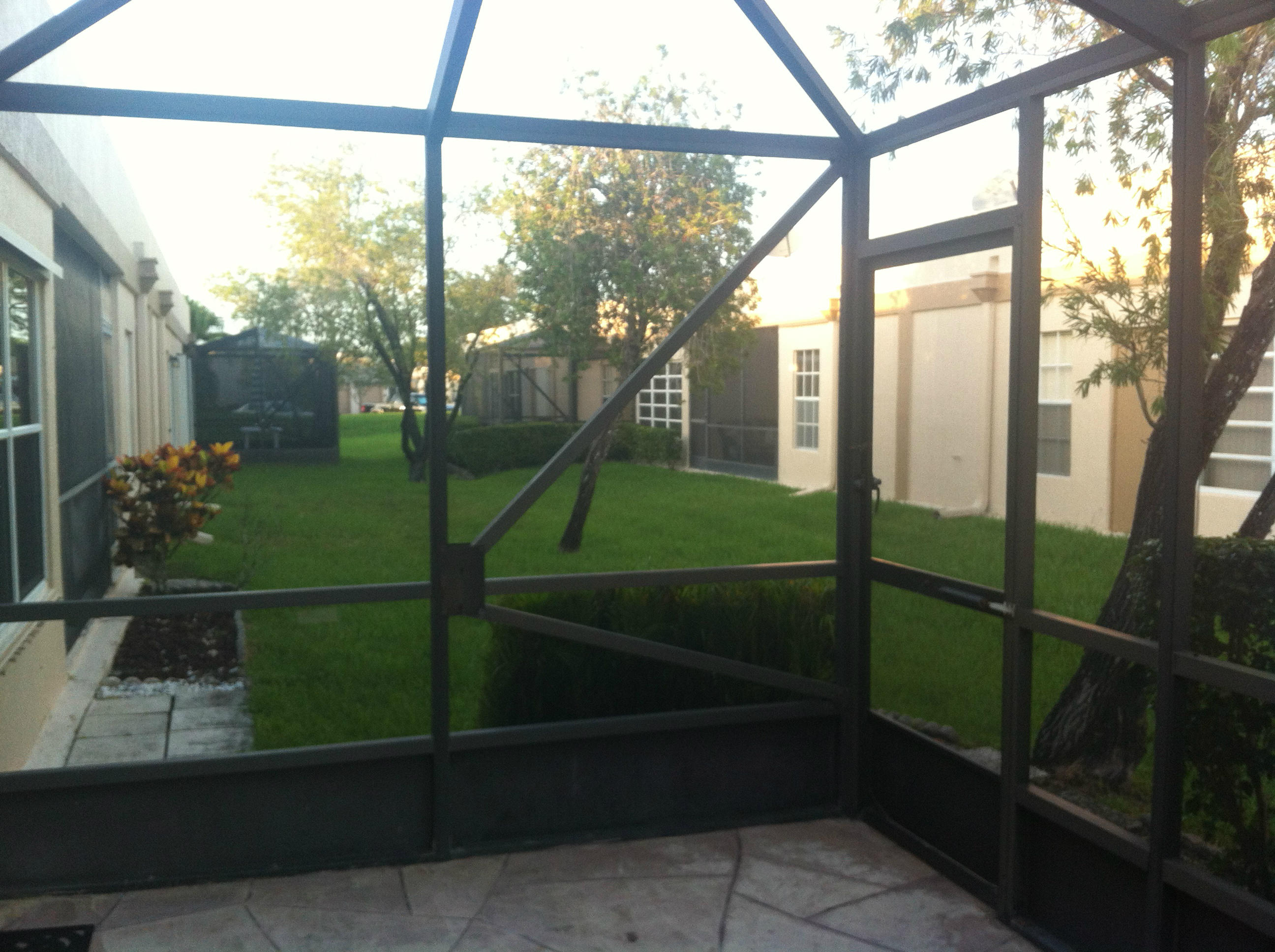 18760 Jolson Avenue, Unit 5 Boca Raton, FL 33496 - Photo 8 of 18 SCREENED PATIO