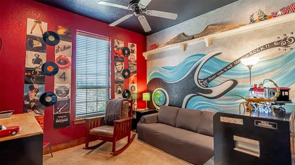 a living room with furniture and a window