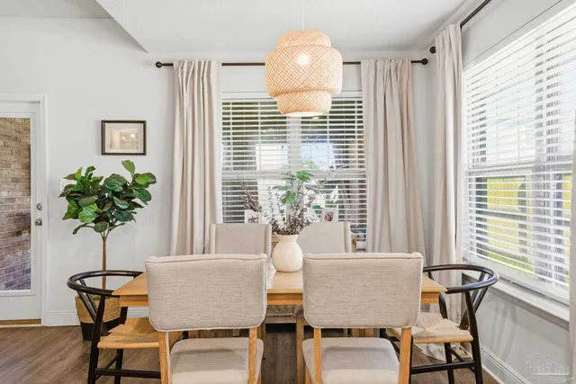 a kitchen with a sink and refrigerator