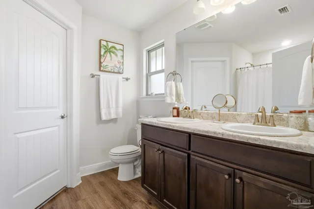 a bathroom with a shower curtain and a shower curtain