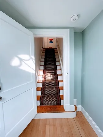 a view of entryway with wooden floor