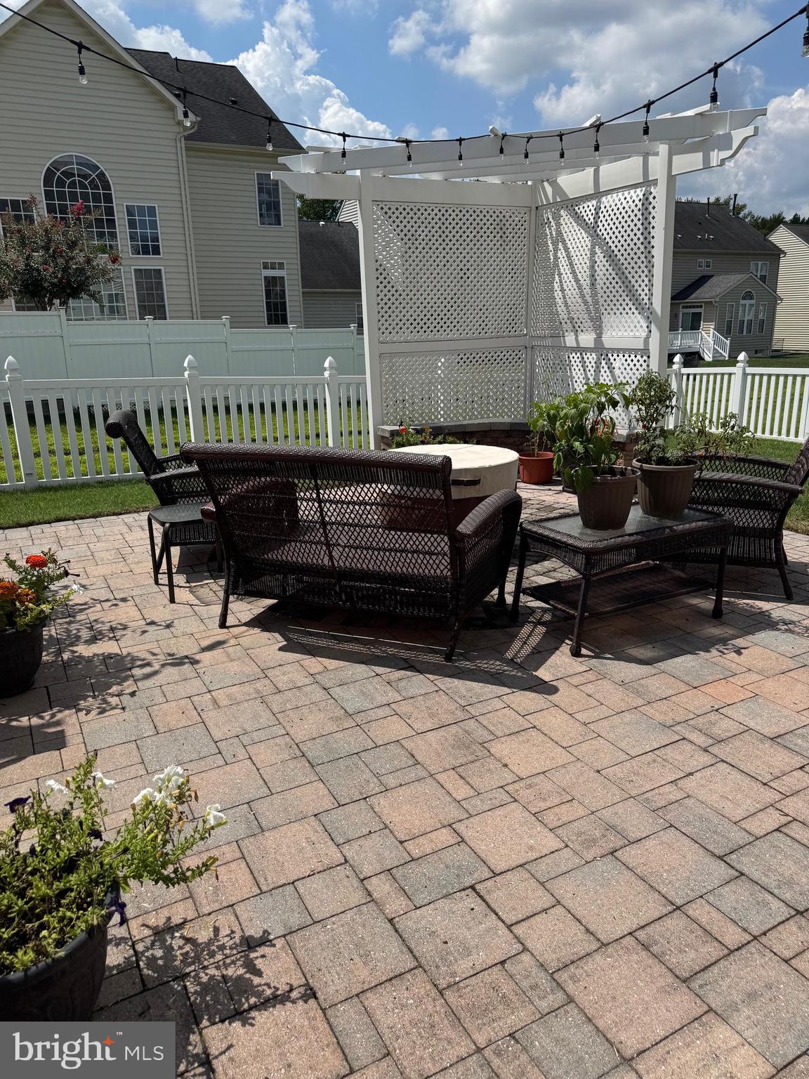 7147 Wedmore Court Hanover, MD 21076 - Photo 3 of 11 a view of a terrace with sitting area