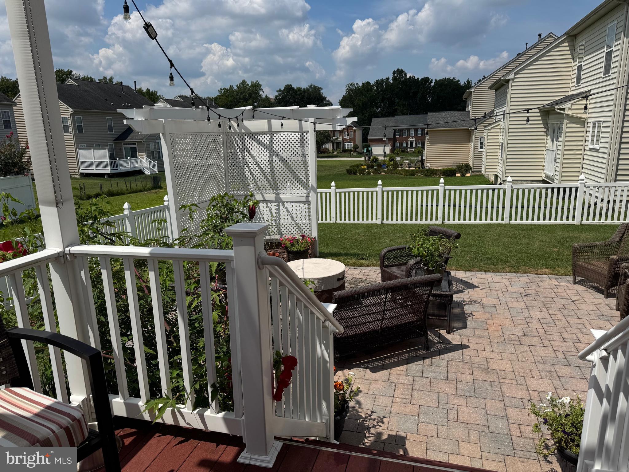 7147 Wedmore Court Hanover, MD 21076 - Photo 5 of 11 a view of a deck with couches and potted plants