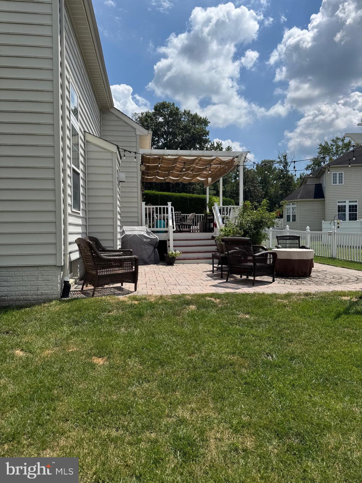 7147 Wedmore Court Hanover, MD 21076 - Photo 6 of 11 a house view with sitting space garden view with a garden