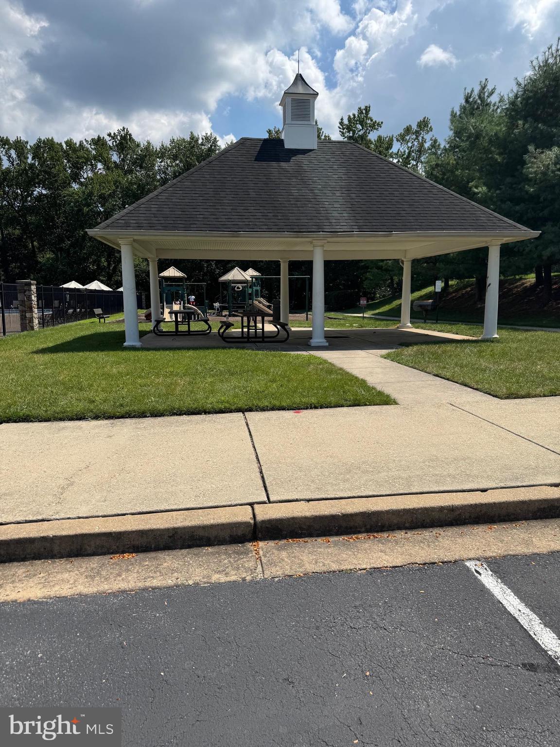 7147 Wedmore Court Hanover, MD 21076 - Photo 10 of 11 a front view of a house with a yard