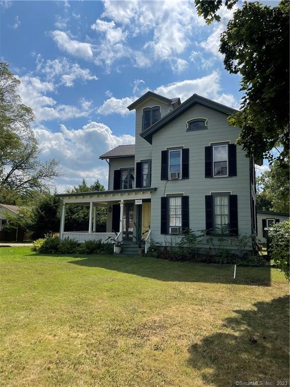 Classical Victorian with front porch and second floor apartment