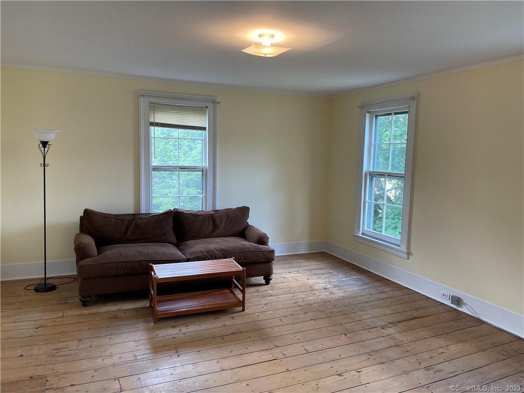 33 West Main Street, Unit 3 Sharon, CT 06069 - Photo 11 of 20 Livingroom is large and is located to the front of the building.