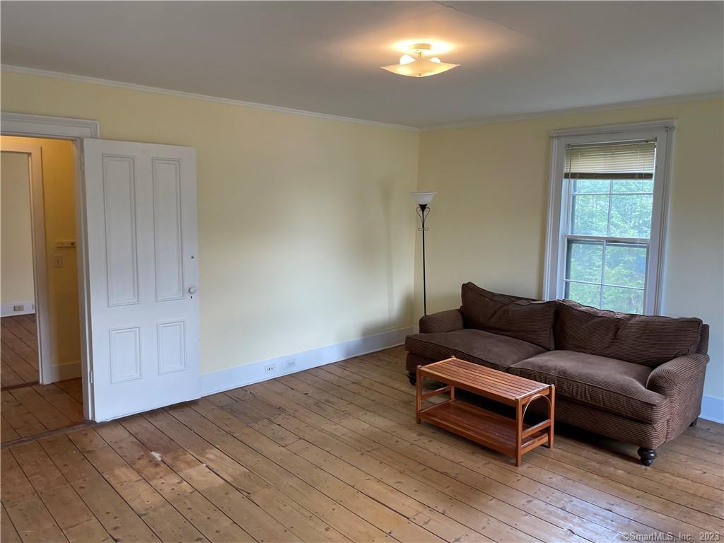 33 West Main Street, Unit 3 Sharon, CT 06069 - Photo 12 of 20 Livingroom is accessed by the hallway and through the bedroom.
