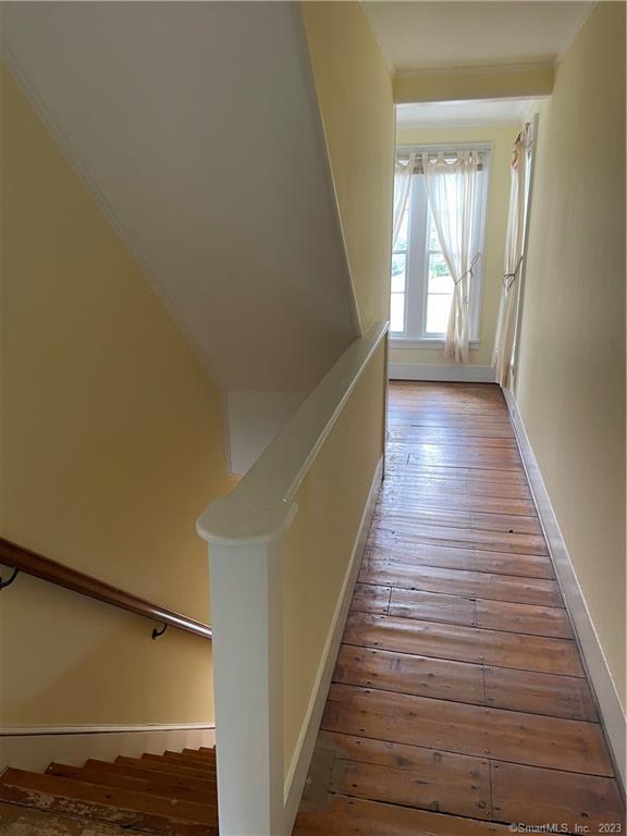 33 West Main Street, Unit 3 Sharon, CT 06069 - Photo 6 of 20 Top of the stairs leads to large hallways.