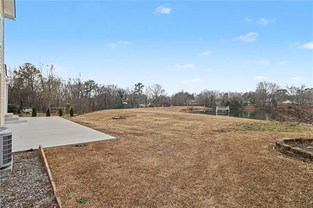 a view of porch with wooden floor and floor to ceiling window