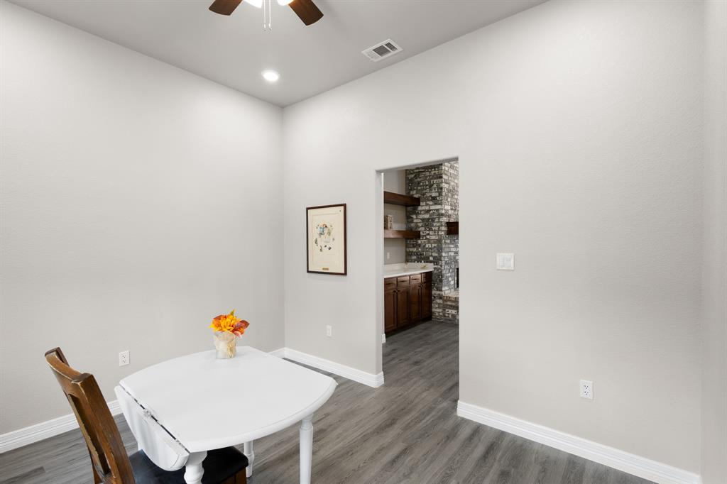1404 Faulkner Road Sunset, TX 76270 - Photo 28 of 40 Dining room with wood finished floors and ceiling fan
