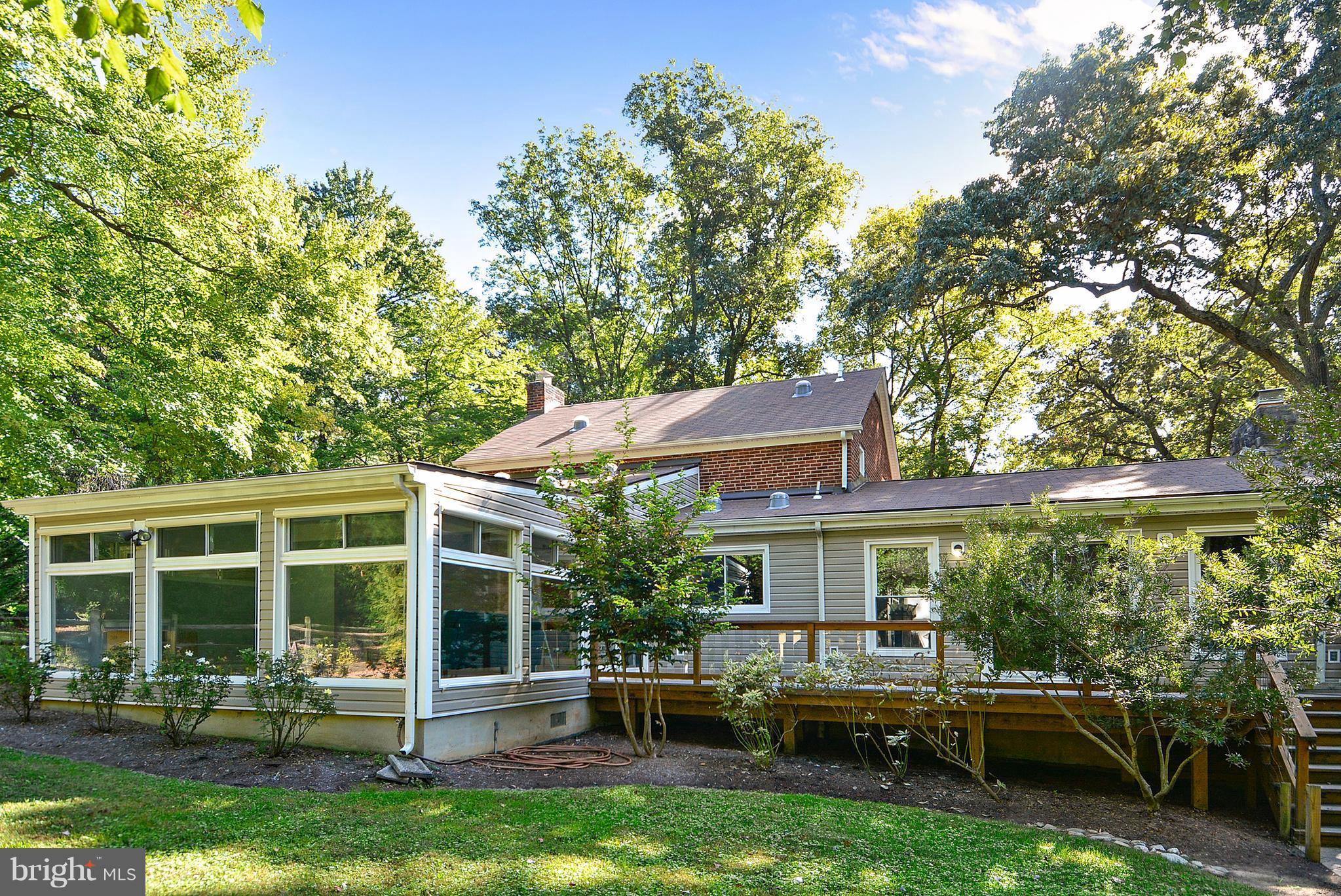 2615 Cool Spring Road Adelphi, MD 20783 - Photo 22 of 30 a view of a house with backyard sitting area and garden