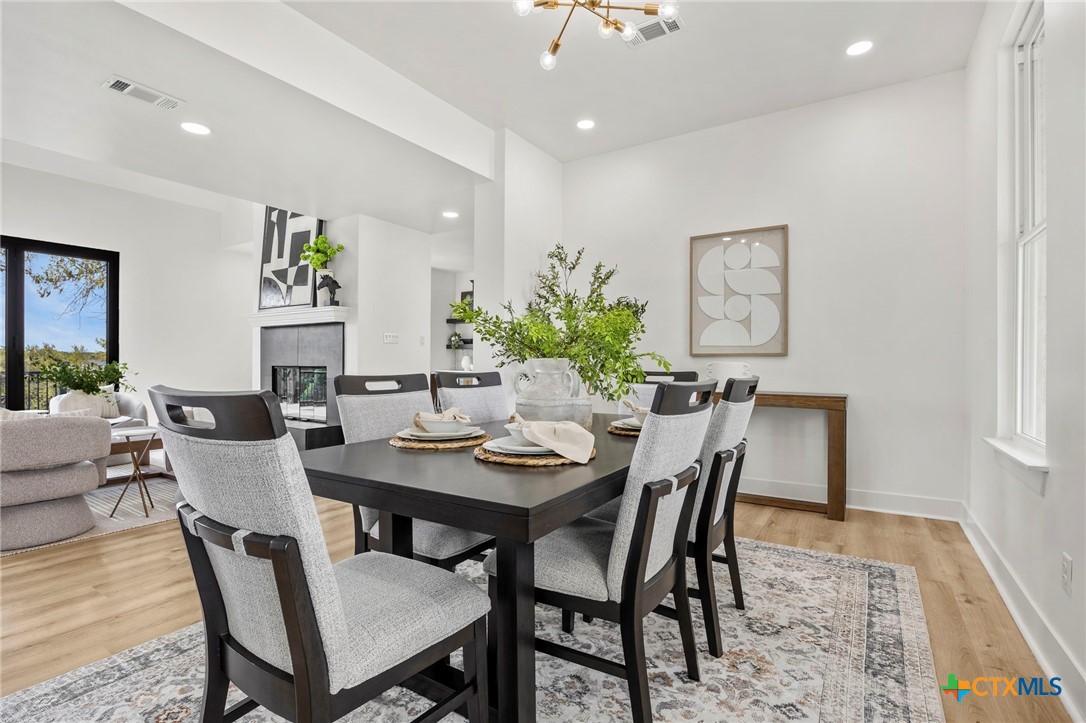 108 Skyline Road Georgetown, TX 78628 - Photo 12 of 48 a view of a dining room with furniture
