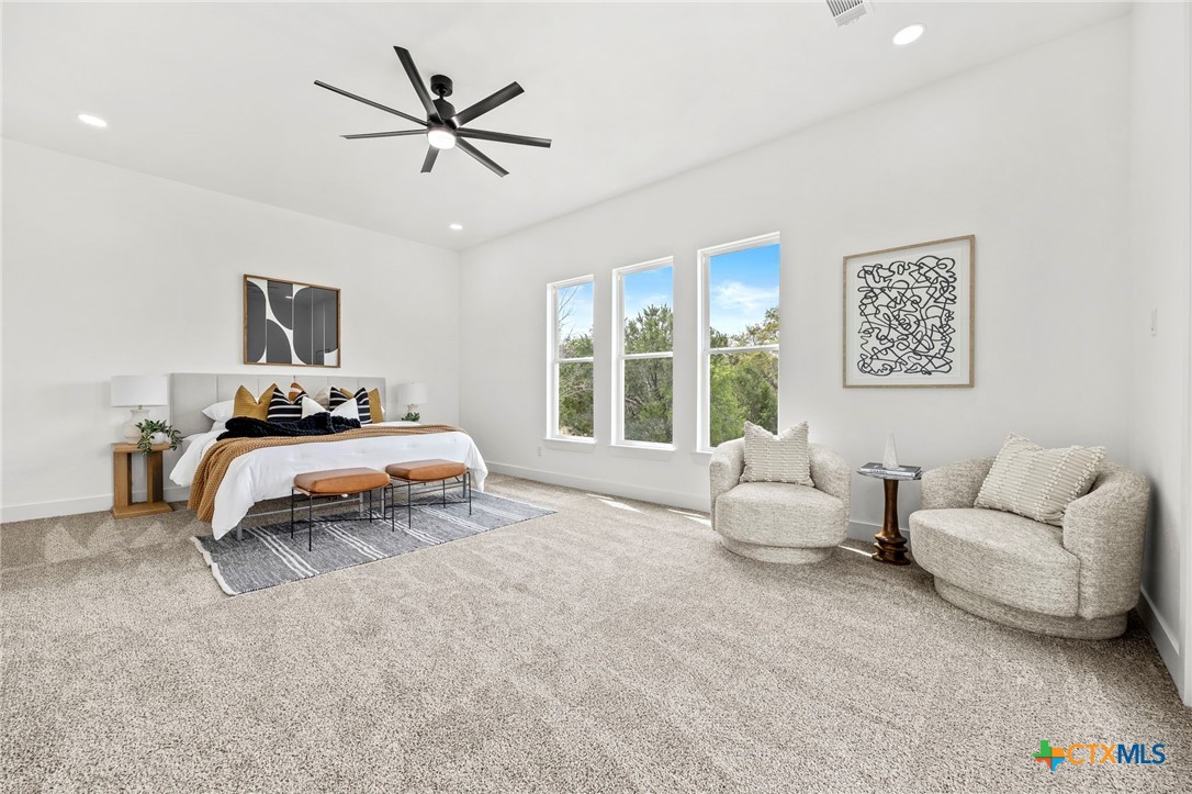 108 Skyline Road Georgetown, TX 78628 - Photo 19 of 48 a bedroom with a bed and a couch