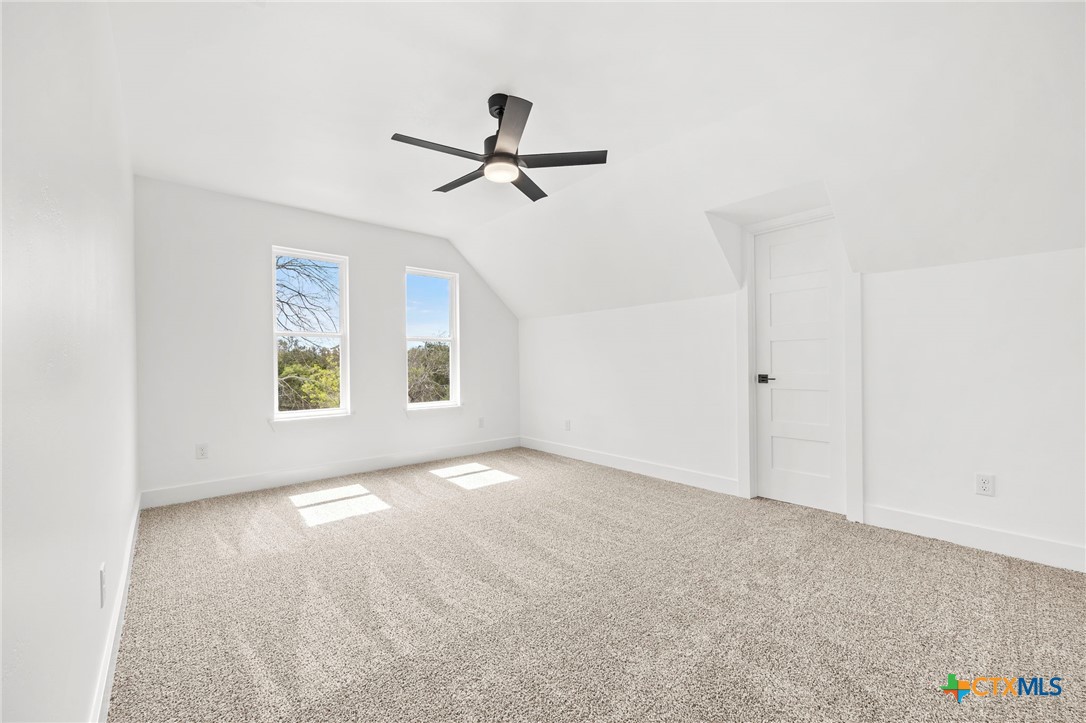 108 Skyline Road Georgetown, TX 78628 - Photo 36 of 48 a view of an empty room with a window
