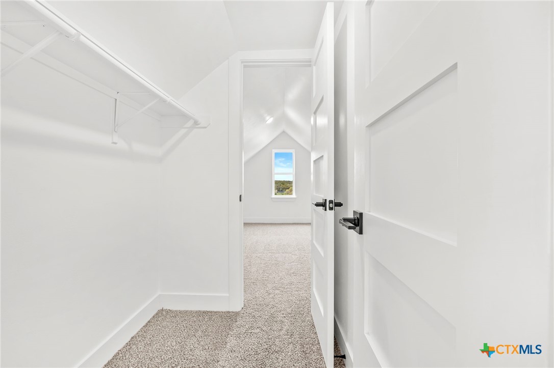 108 Skyline Road Georgetown, TX 78628 - Photo 39 of 48 a view of a hallway with a white walls and a white walls