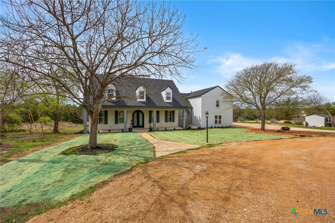 108 Skyline Road Georgetown, TX 78628 - Photo 46 of 48 a house with trees in the background