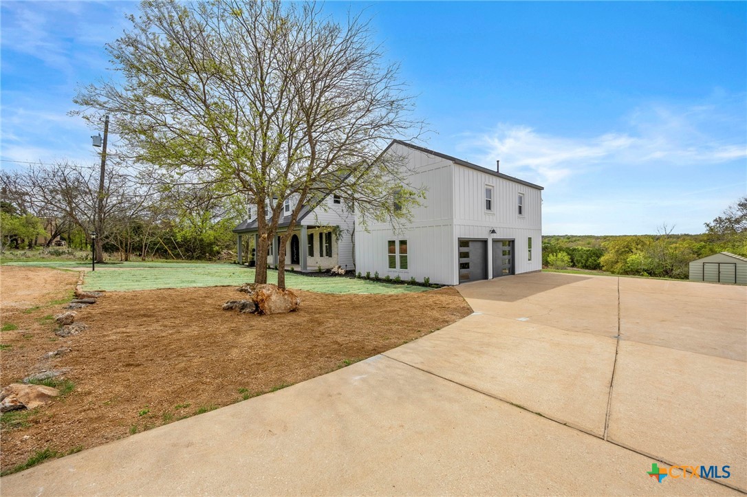 108 Skyline Road Georgetown, TX 78628 - Photo 47 of 48 a view of a house with backyard and trees