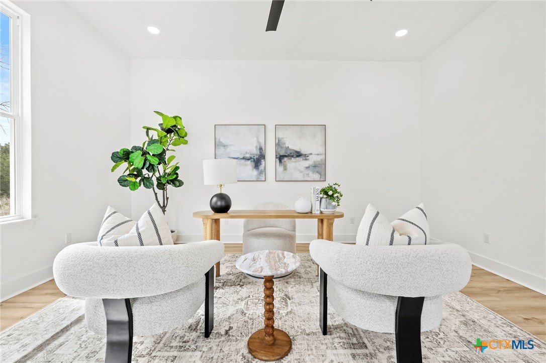 108 Skyline Road Georgetown, TX 78628 - Photo 8 of 48 a living room with furniture and a table