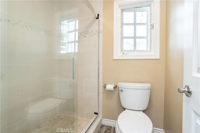 a view of a swimming pool with sitting area