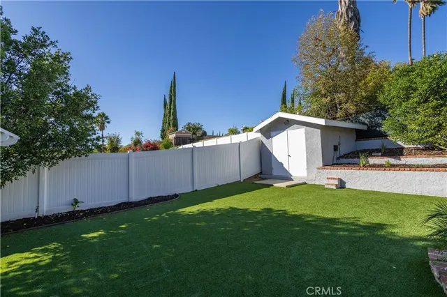 a room with a bed and window