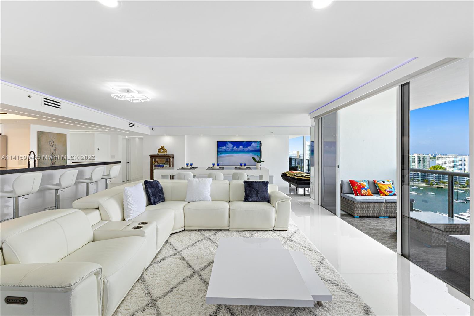 Miami Beach Miami Beach, FL 33139 - Photo 14 of 41 a living room with furniture and a large window