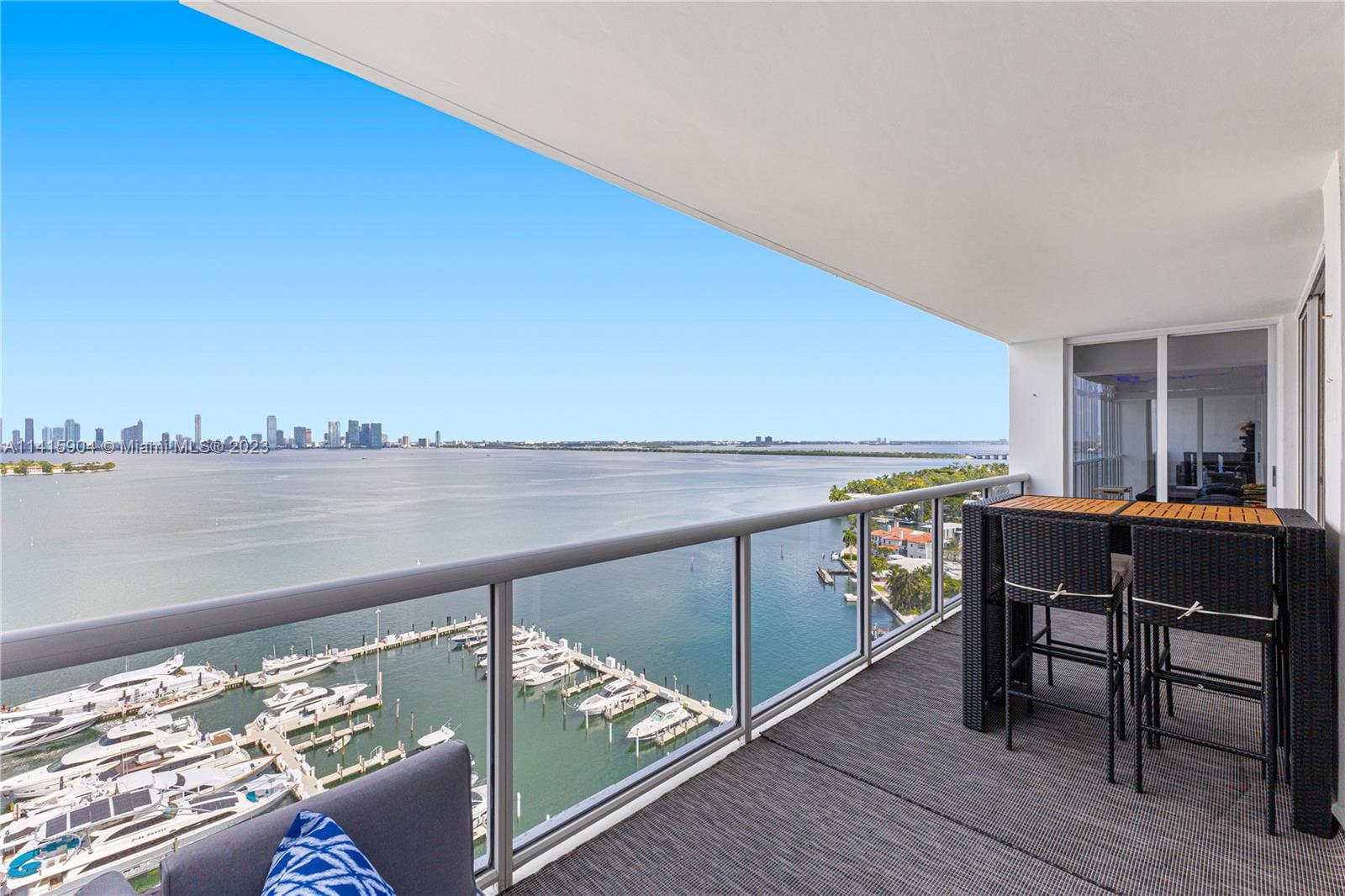 Miami Beach Miami Beach, FL 33139 - Photo 16 of 41 a view of a chairs and table on the terrace