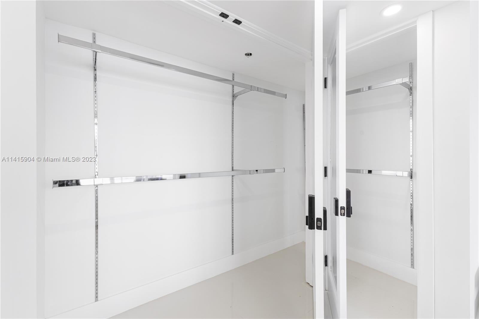 Miami Beach Miami Beach, FL 33139 - Photo 40 of 41 a bathroom with a shower and a glass door